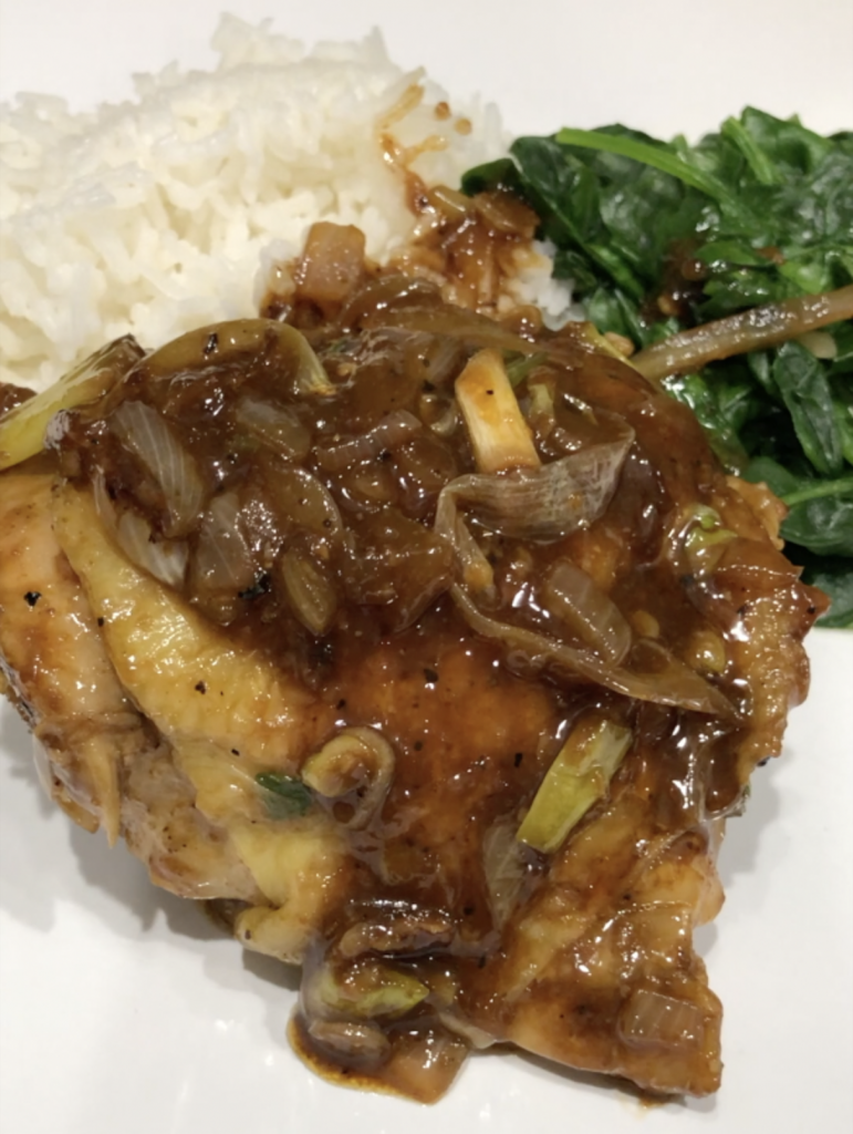 One piece chicken thigh with soy glazed, sautéed spinach garlic sauce and jasmine rice