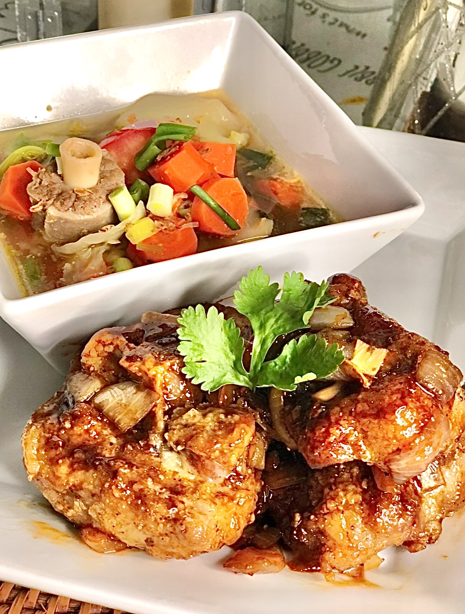 2 large, round, crispy fried oxtail pieces coated with flour and lightly glazed with sweet dark soy sauce. Then on a separate bowl is the soup vegetable (chopped round carrot not long, with cabbage with a few cilantro on top of the soup.